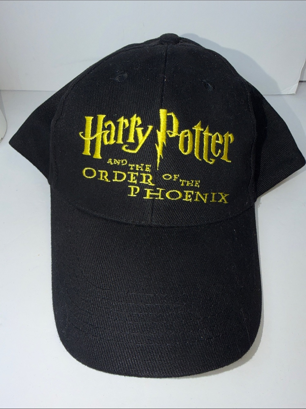 Warner Bros. Harry Potter Black Cap with Yellow Embroidered Logo
